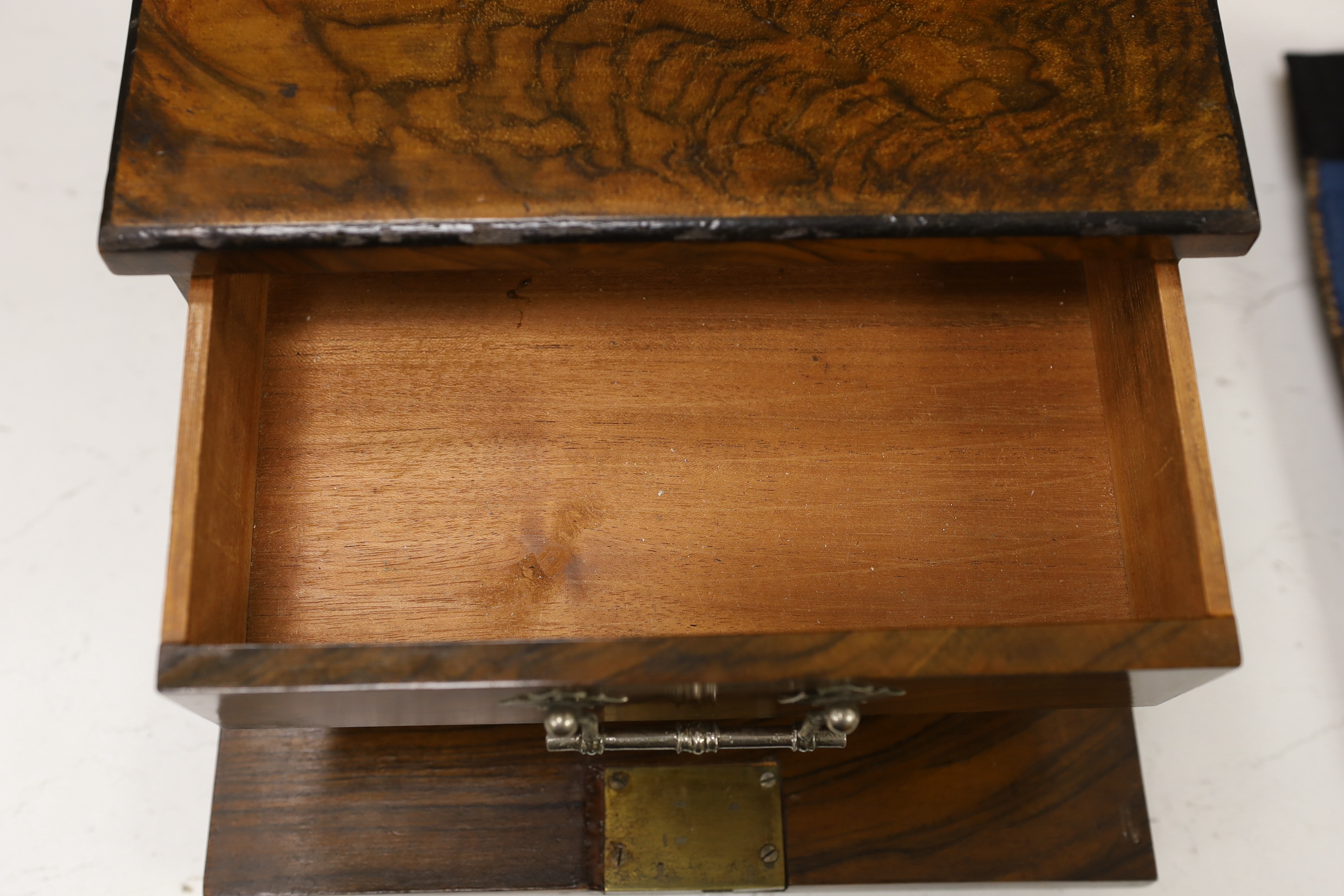 A small walnut case enclosing two drawers